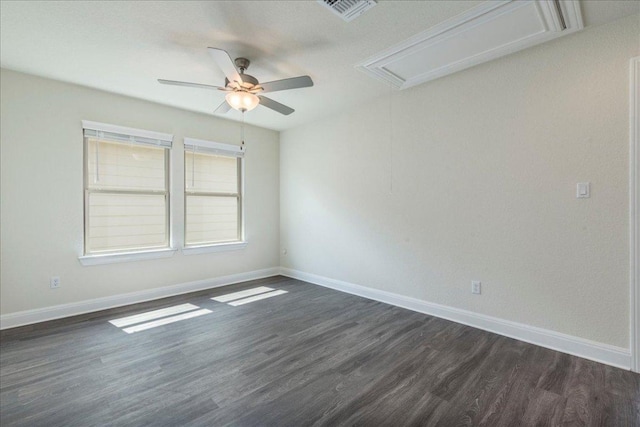 3209 Maysillee St, Austin, TX 78728 - spare room featuring dark wood-style flooring, a ceiling fan, visible vents, and attic access