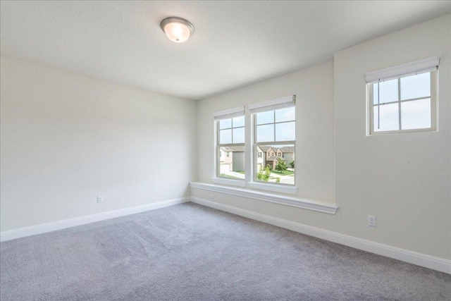 3209 Maysillee St, Austin, TX 78728 - empty room with baseboards and carpet