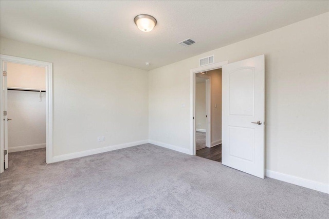 3209 Maysillee St, Austin, TX 78728 - unfurnished bedroom with baseboards, carpet, and visible vents