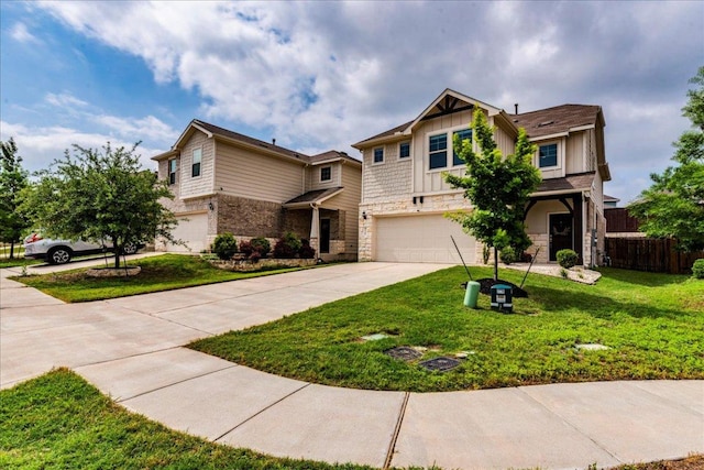 view of front of property featuring a front lawn, fence, stone siding, concrete driveway, and an attached garage
