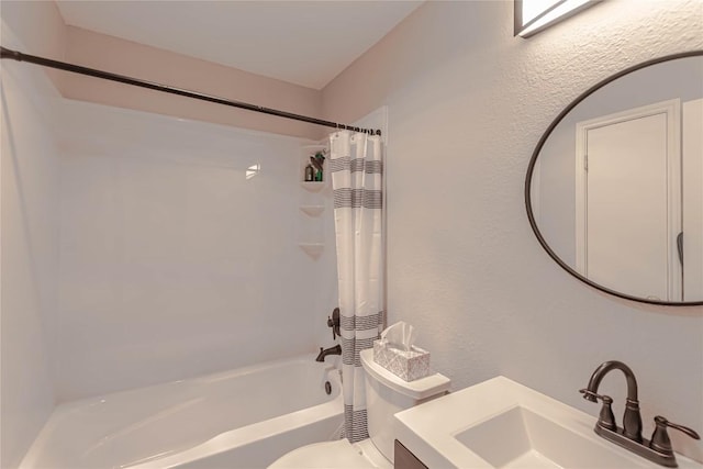full bath with vanity, a textured wall, toilet, and shower / bathtub combination with curtain