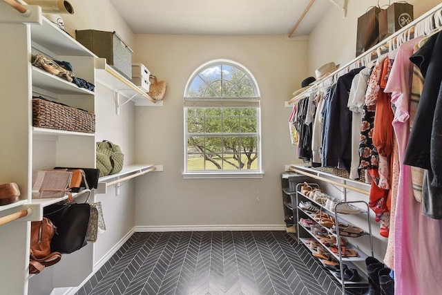 spacious closet featuring tile patterned floors