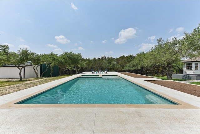 pool with a patio area
