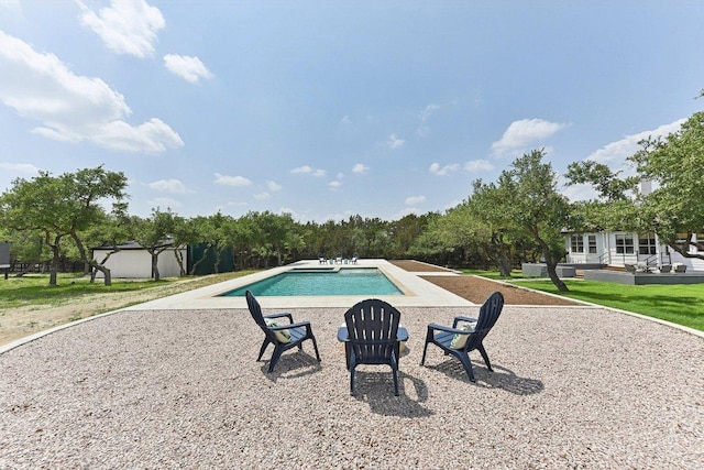 outdoor pool featuring a patio area