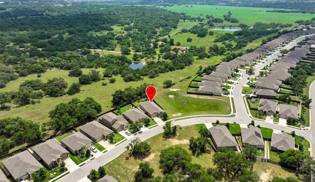 aerial view featuring a water view and a residential view