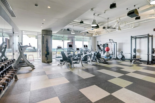 gym featuring recessed lighting