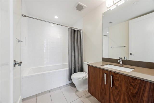 bathroom featuring visible vents, tile patterned flooring, vanity, toilet, and shower / bath combo with shower curtain