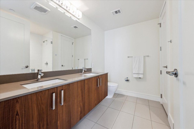 full bathroom featuring visible vents, a sink, and tile patterned flooring