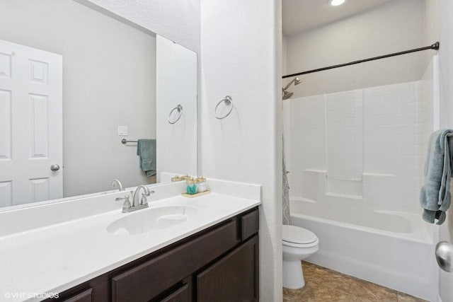 bathroom featuring toilet, shower / tub combo with curtain, and vanity
