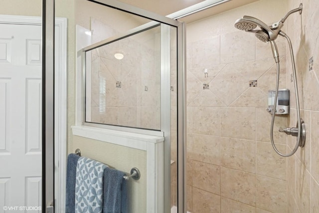bathroom with a stall shower