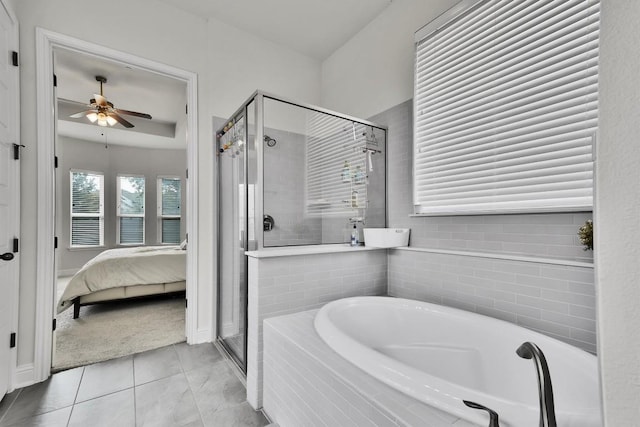 full bath featuring ceiling fan, tile patterned flooring, ensuite bath, a shower stall, and a bath
