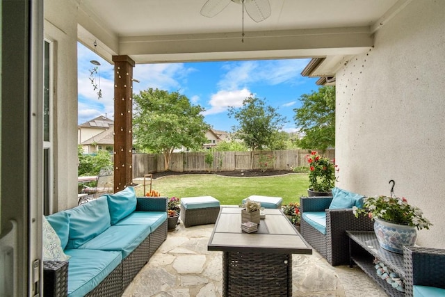 view of patio / terrace featuring ceiling fan, an outdoor hangout area, and a fenced backyard