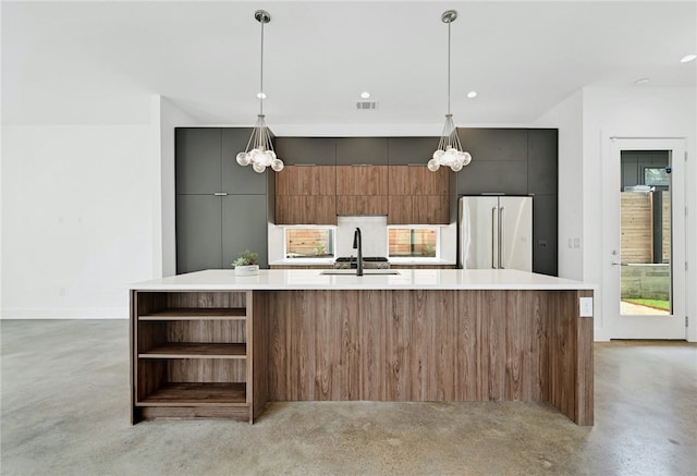 kitchen featuring an inviting chandelier, open shelves, modern cabinets, a spacious island, and high quality fridge