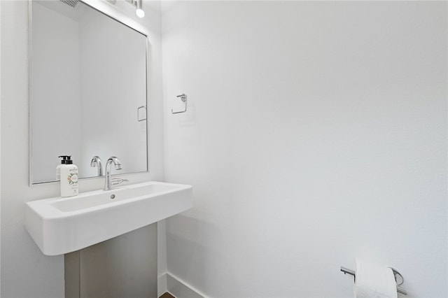 bathroom featuring baseboards