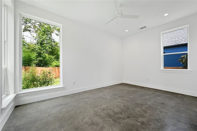 spare room with baseboards, a ceiling fan, recessed lighting, and visible vents