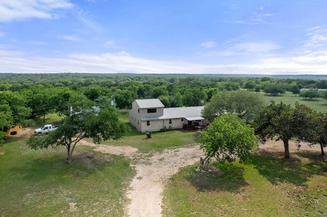 aerial view featuring a view of trees