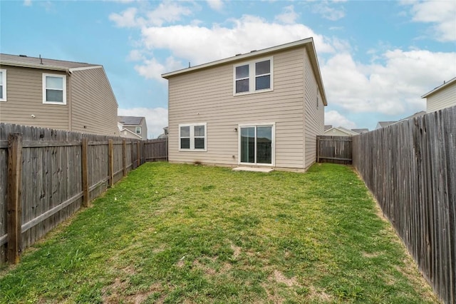 509 Peony Ct, Jarrell, TX 76537 - back of house featuring a fenced backyard and a yard