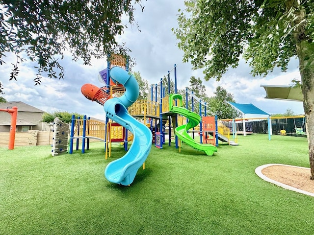 509 Peony Ct, Jarrell, TX 76537 - communal playground with fence and a yard