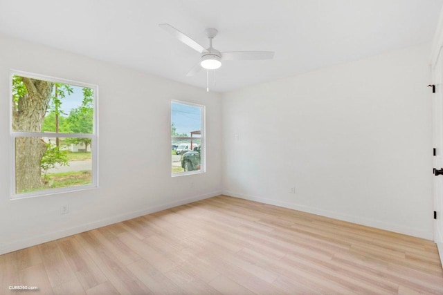 381 Perryman St, New Braunfels, TX 78130 - unfurnished room featuring light wood-style floors, baseboards, and a ceiling fan