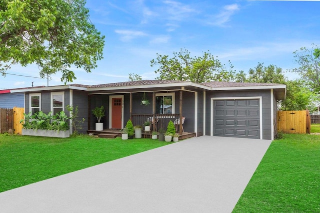 view of front of property with a porch, a garage, fence, and concrete driveway