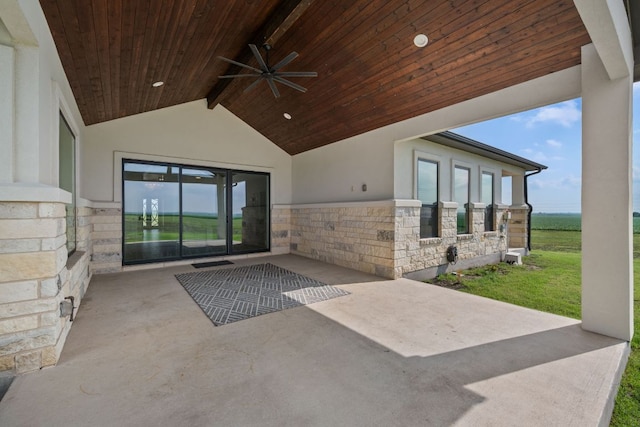 view of patio featuring ceiling fan