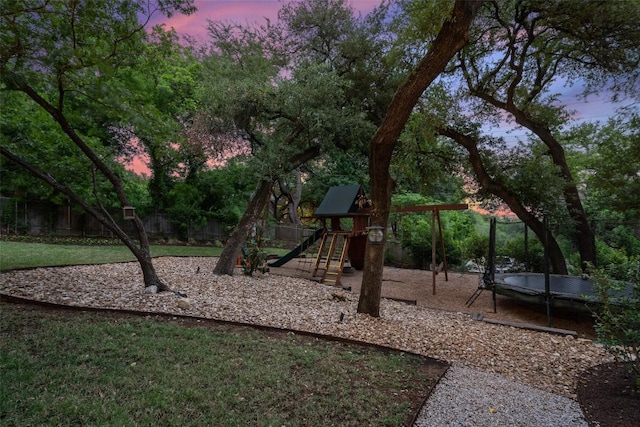 4203 Balcones Dr, Austin, TX 78731 - playground at dusk featuring a trampoline