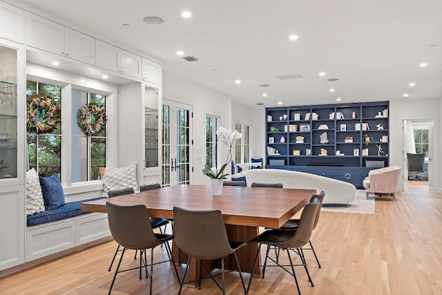 4203 Balcones Dr, Austin, TX 78731 - dining space with light wood-style floors, recessed lighting, and french doors
