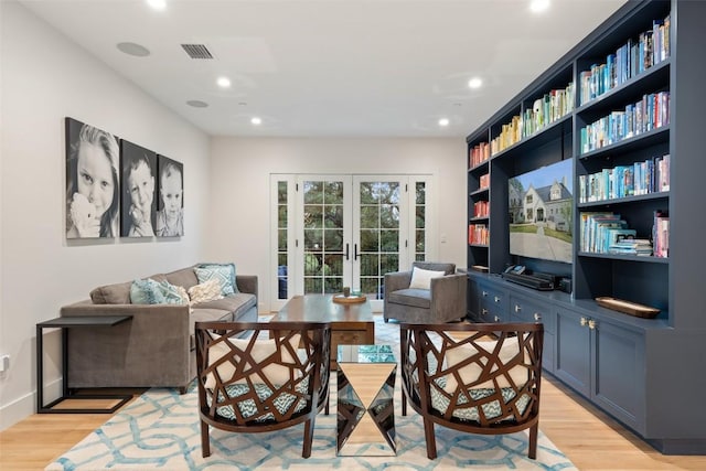 4203 Balcones Dr, Austin, TX 78731 - living area with french doors, light wood-style flooring, and recessed lighting