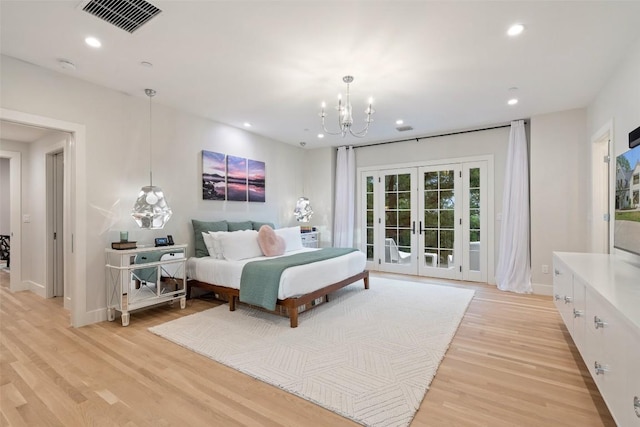 4203 Balcones Dr, Austin, TX 78731 - bedroom featuring access to outside, light wood-type flooring, french doors, a chandelier, and baseboards