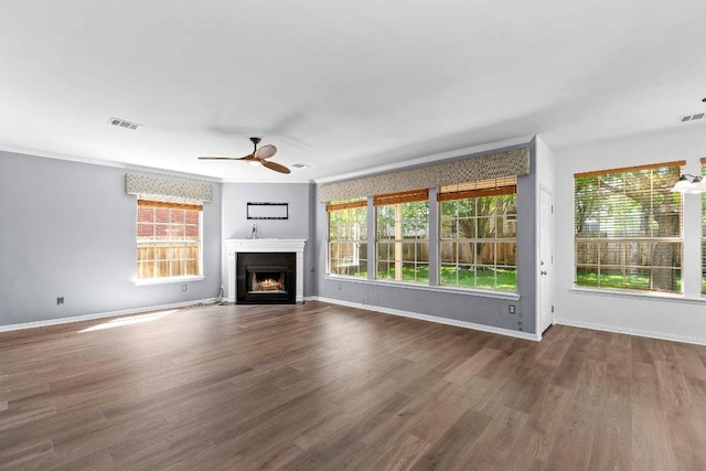 1809 Johnson Way, Round Rock, TX 78681 - unfurnished living room with a fireplace with flush hearth, a healthy amount of sunlight, ceiling fan, and visible vents