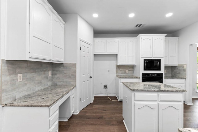 1809 Johnson Way, Round Rock, TX 78681 - kitchen with white cabinetry, visible vents, tasteful backsplash, and black appliances
