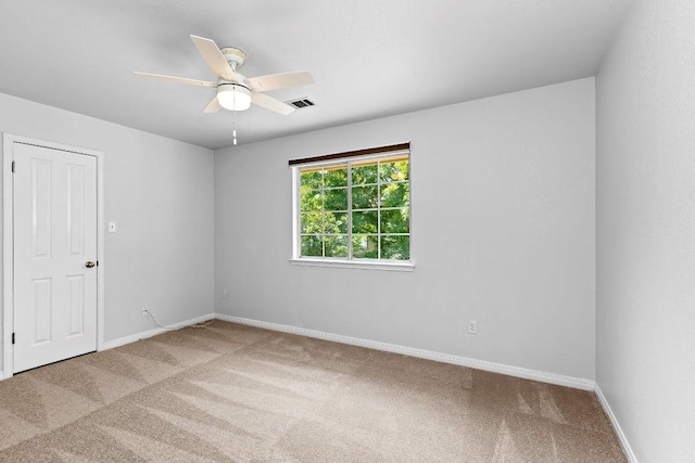 1809 Johnson Way, Round Rock, TX 78681 - unfurnished room with carpet, baseboards, a ceiling fan, and visible vents