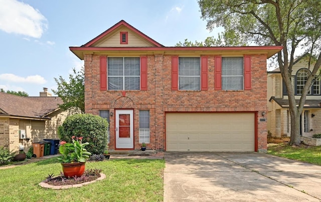 traditional-style house with brick siding, driveway, a front yard, and a garage