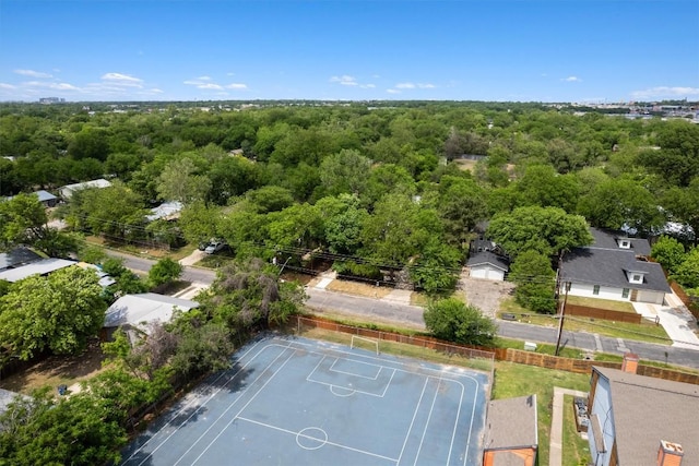 drone / aerial view with a view of trees