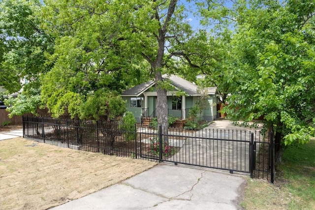 view of gate featuring a fenced front yard