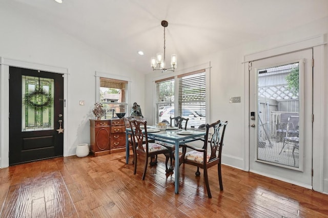 1185 Coleto St, Austin, TX 78702 - dining room with a chandelier, light wood-style floors, lofted ceiling, and recessed lighting