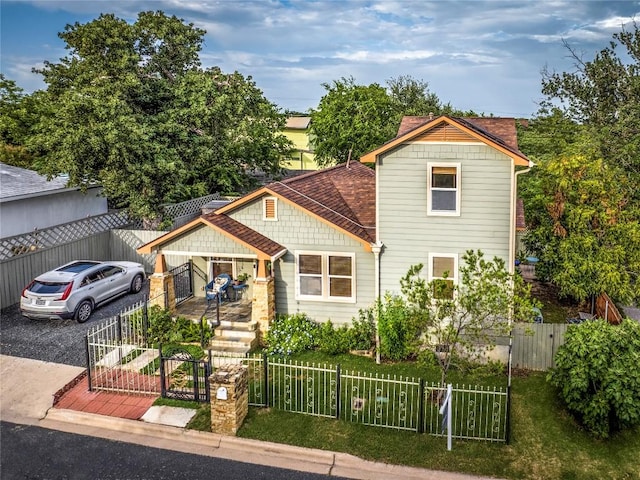 1185 Coleto St, Austin, TX 78702 - view of front of house with a gate and a fenced front yard
