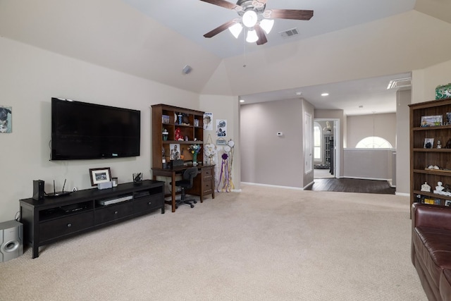 376 Sweet Gum Dr, Kyle, TX 78640 - living area featuring carpet floors, a ceiling fan, lofted ceiling, a desk, and baseboards
