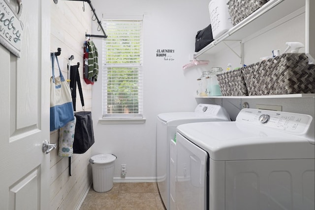 376 Sweet Gum Dr, Kyle, TX 78640 - washroom with washing machine and dryer, baseboards, and light tile patterned floors