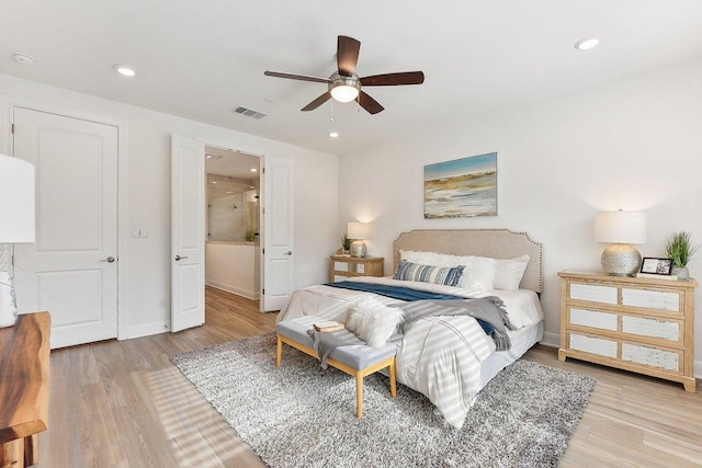bedroom featuring recessed lighting, baseboards, visible vents, and light wood-type flooring