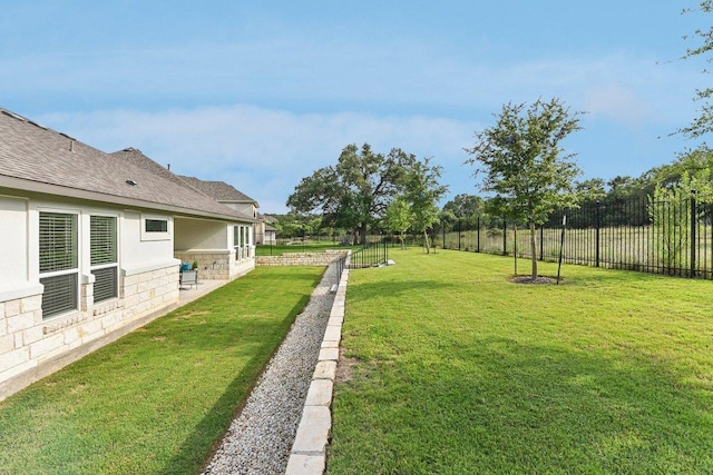 view of yard featuring fence
