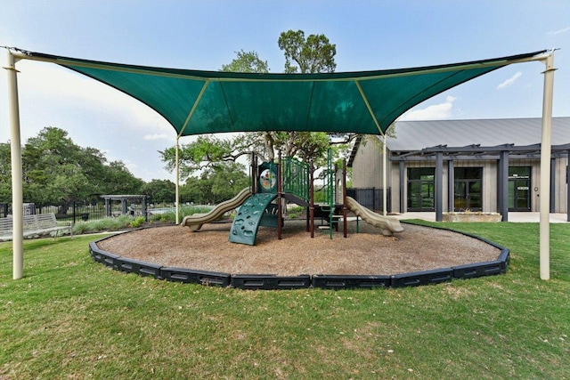 community play area featuring a lawn and a pergola