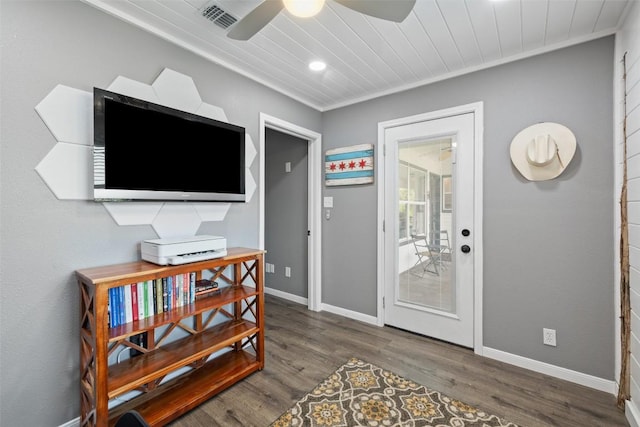 interior space featuring ceiling fan, visible vents, wood finished floors, wooden ceiling, and baseboards
