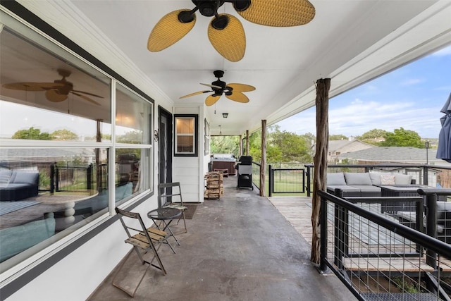 exterior space featuring ceiling fan and an outdoor hangout area