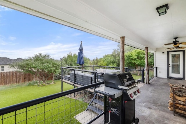 view of patio with a fenced backyard, ceiling fan, and grilling area
