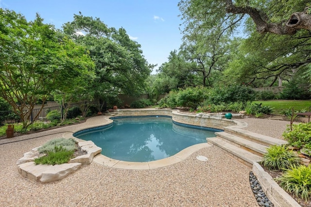 view of pool with a fenced in pool and a fenced backyard