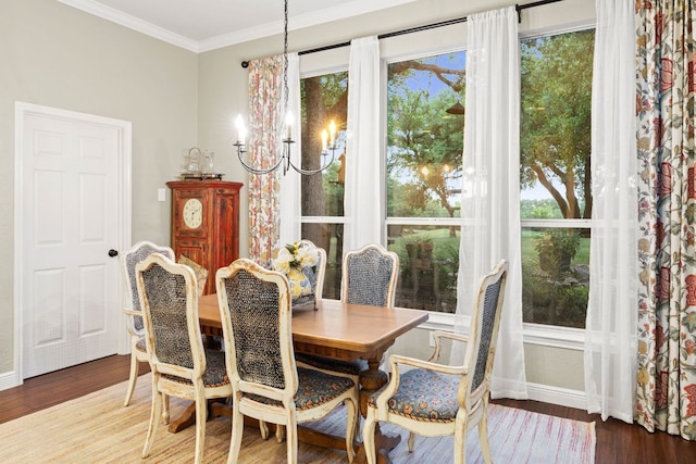 109 Lost Spur, Horseshoe Bay, TX 78657 - dining room featuring crown molding, baseboards, wood finished floors, and a chandelier