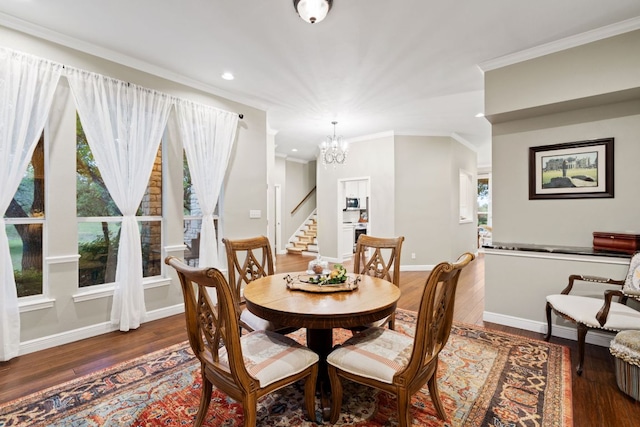 109 Lost Spur, Horseshoe Bay, TX 78657 - dining room with stairs, a notable chandelier, a healthy amount of sunlight, and wood finished floors
