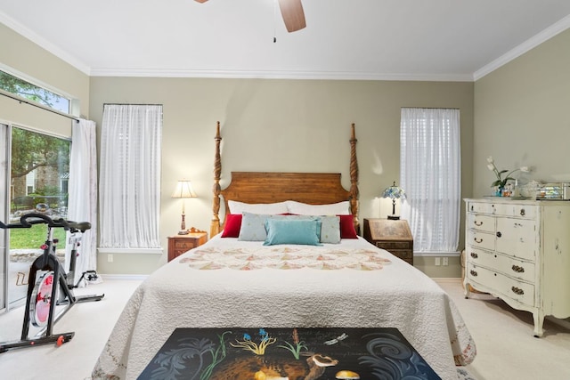 109 Lost Spur, Horseshoe Bay, TX 78657 - bedroom featuring carpet floors, a ceiling fan, crown molding, and baseboards
