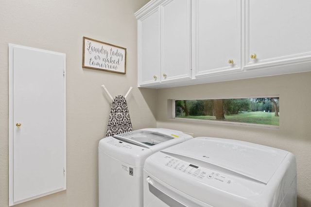 109 Lost Spur, Horseshoe Bay, TX 78657 - washroom featuring cabinet space and washing machine and dryer